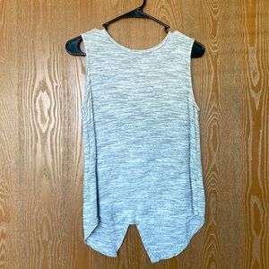Light grey tank top with slit opening in back